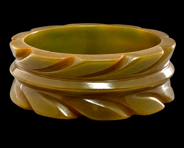 vintage wide slash carved olive green bakelite bangle